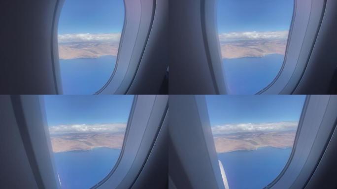 第一人称视角从下面加那利群岛的飞机窗口向外看