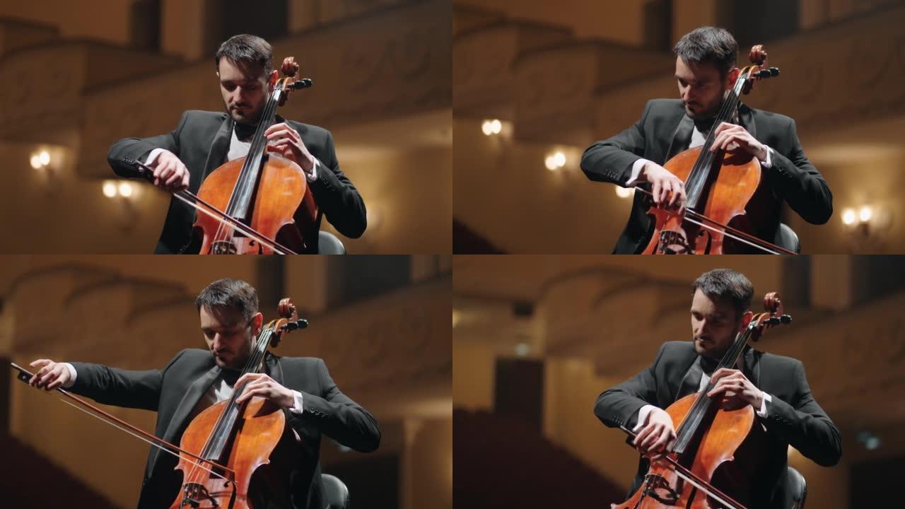 男子在音乐厅演奏大提琴，在老歌剧院或爱乐音乐厅演奏小提琴演奏家的肖像