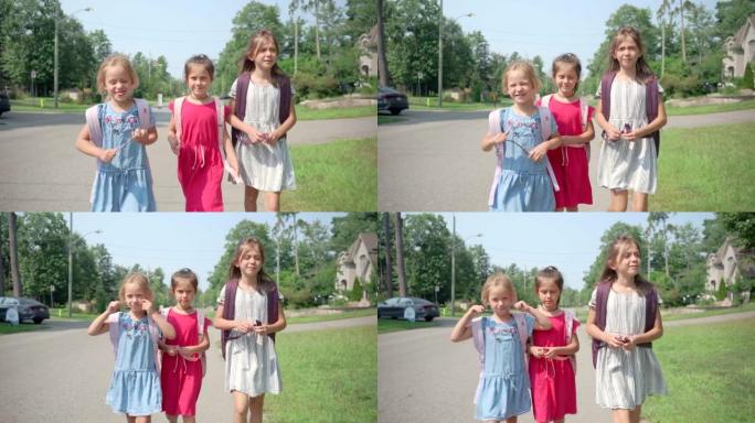 Young girls leaving for school.