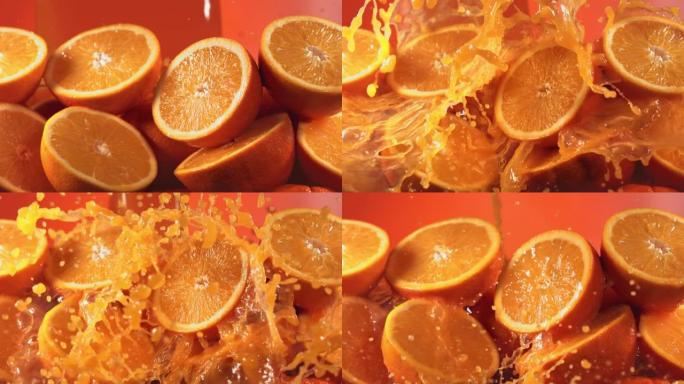 橙汁溅过橙片的慢动作镜头