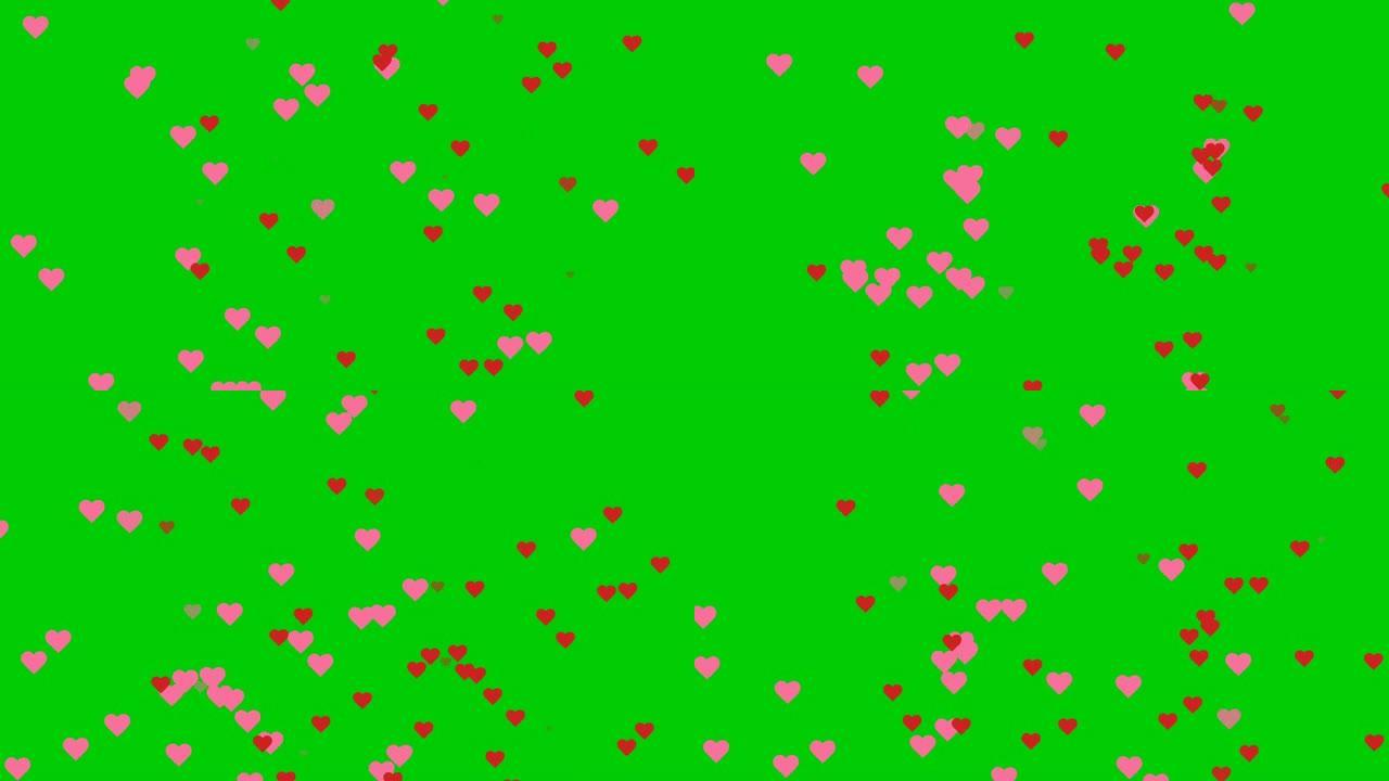 绿屏背景上的心雨或爱情符号。
