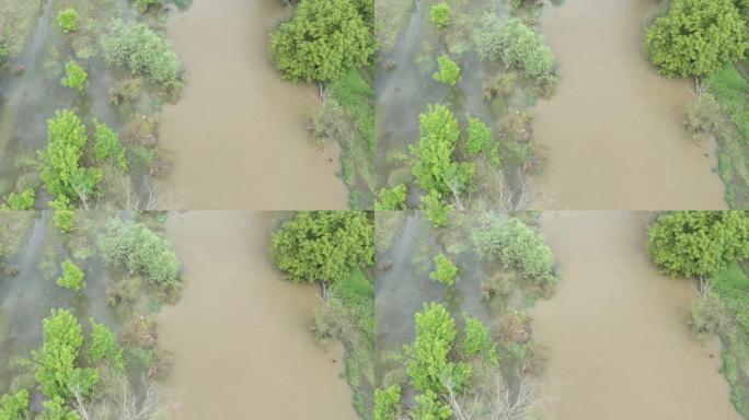 大雨后，用脏水在河上飞行4k无人机视频