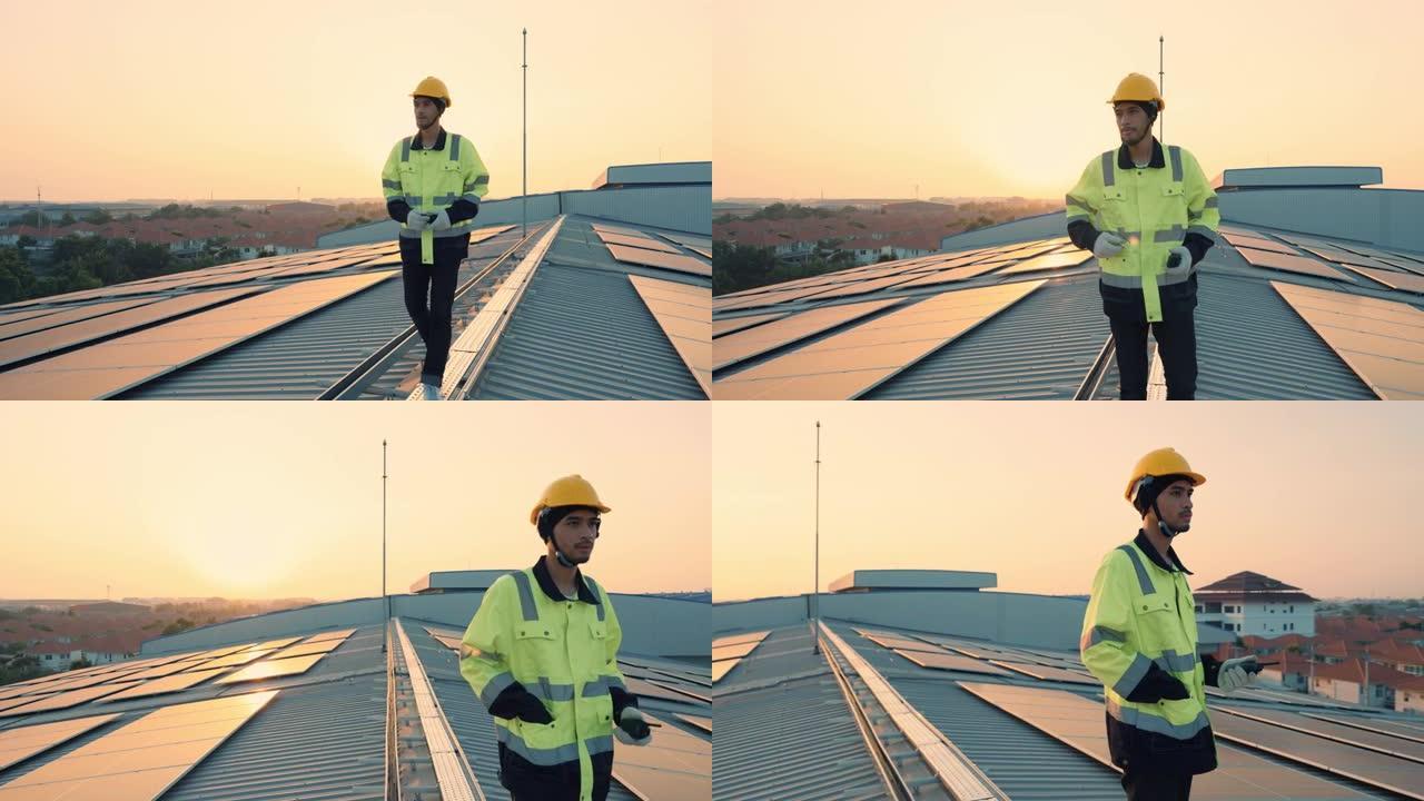 维修工程师技术人员在工厂工作时从太阳能屋顶发电