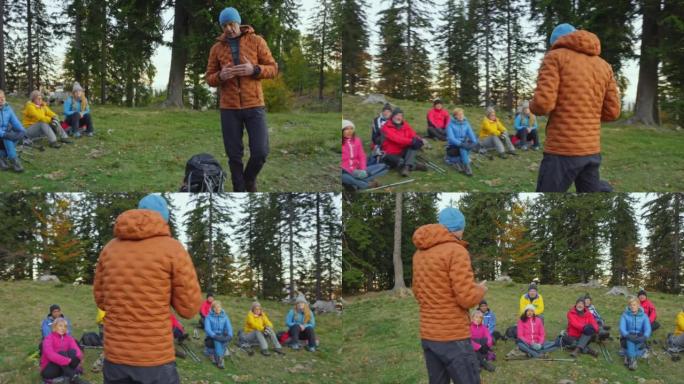 登山向导在远足前与一群徒步旅行者交谈