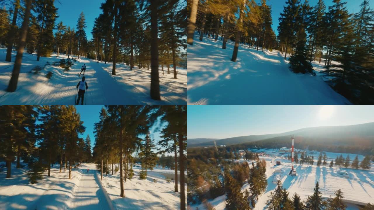 FPV无人机鸟瞰图雪松森林景观与滑雪跑
