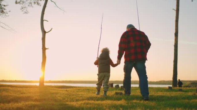 小男孩在大自然中与祖父共度时光，老渔民和孩子要去河边钓鱼