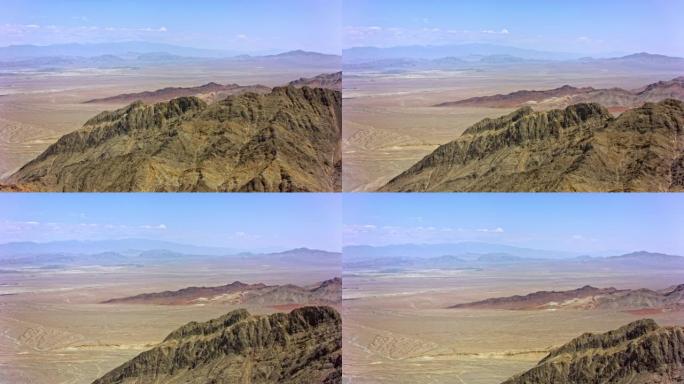 沿着美国内华达州的一座山空中航行，可以看到沙漠山谷