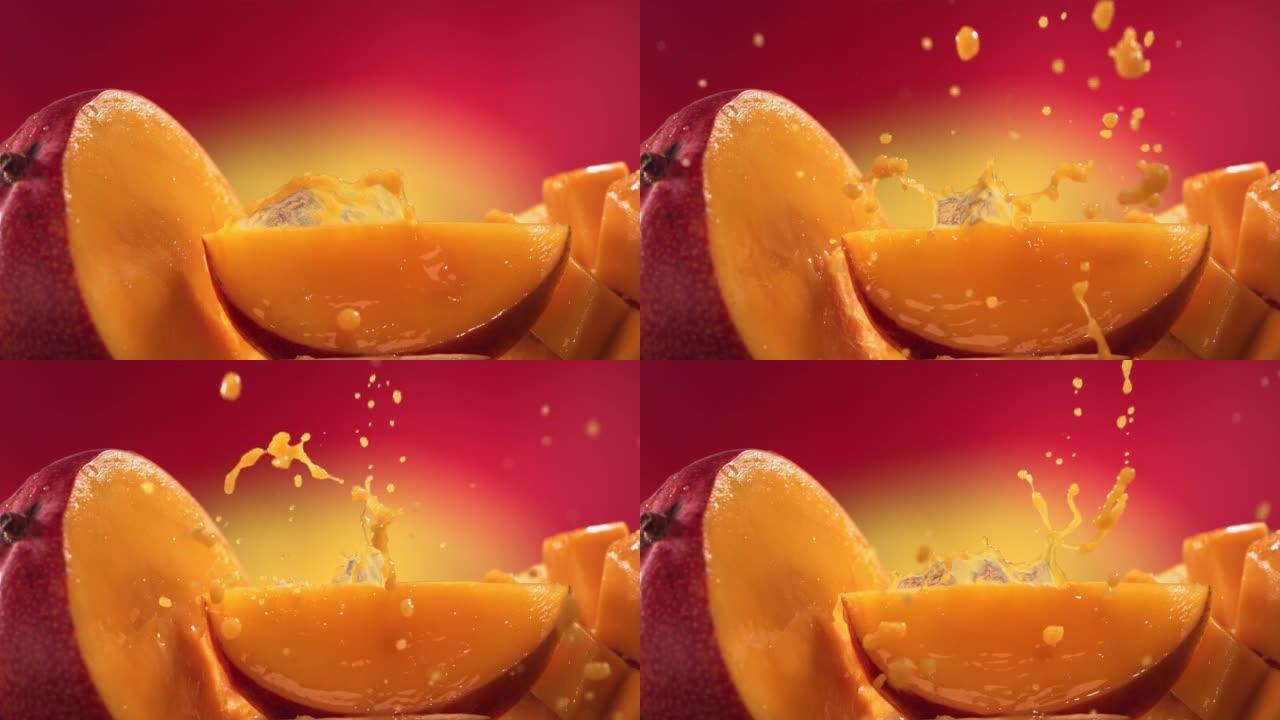 芒果汁溅过芒果片的慢动作镜头