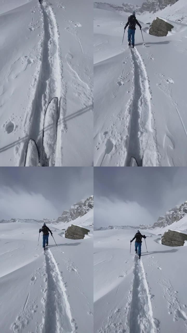 滑雪板上雪地徒步旅行者的第一人称视角