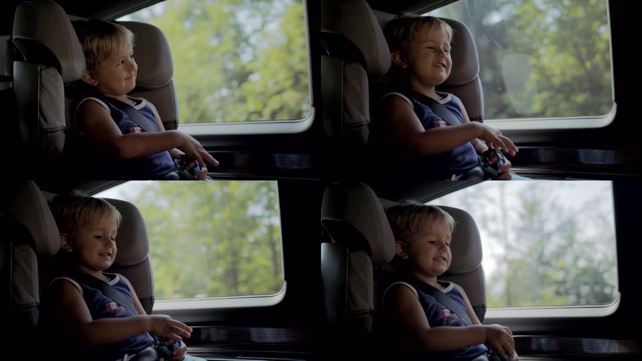一个小男孩坐在车里看着窗外的细节照片
