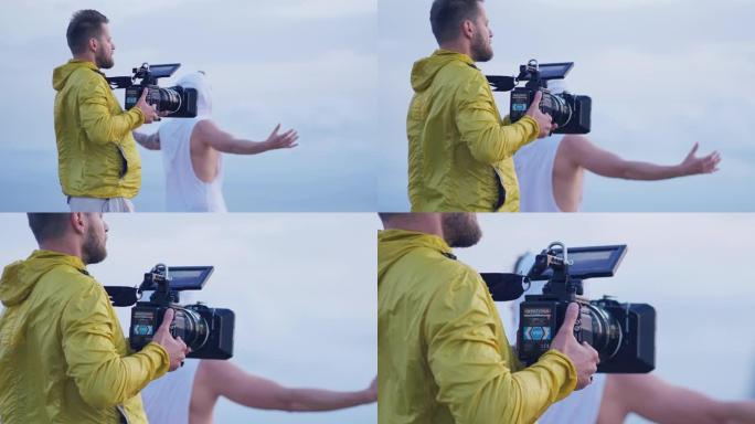 男人用专业相机拍摄电影