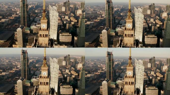 高层PKIN大楼顶部带有塔钟的尖顶空中下降镜头。背景中的现代高层建筑。波兰华沙