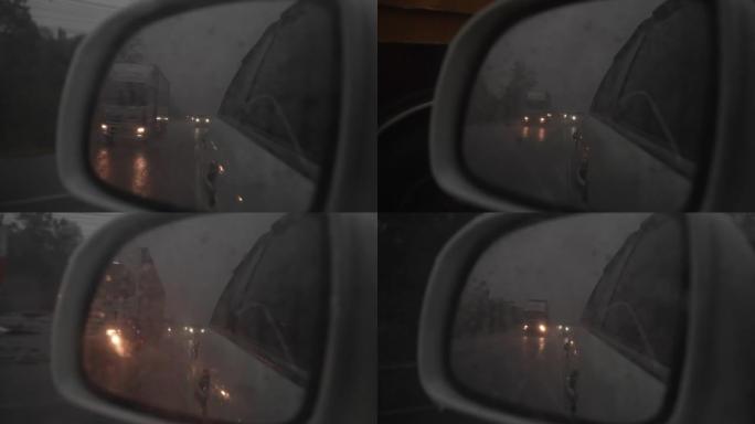雨天透过汽车侧镜看到的城市街道