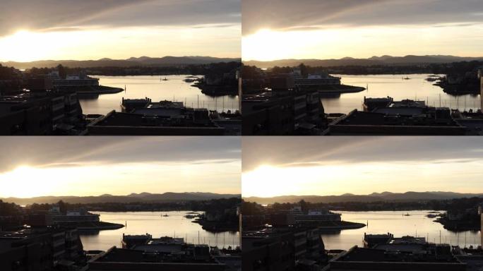 维多利亚港和遥远山丘的日落景色