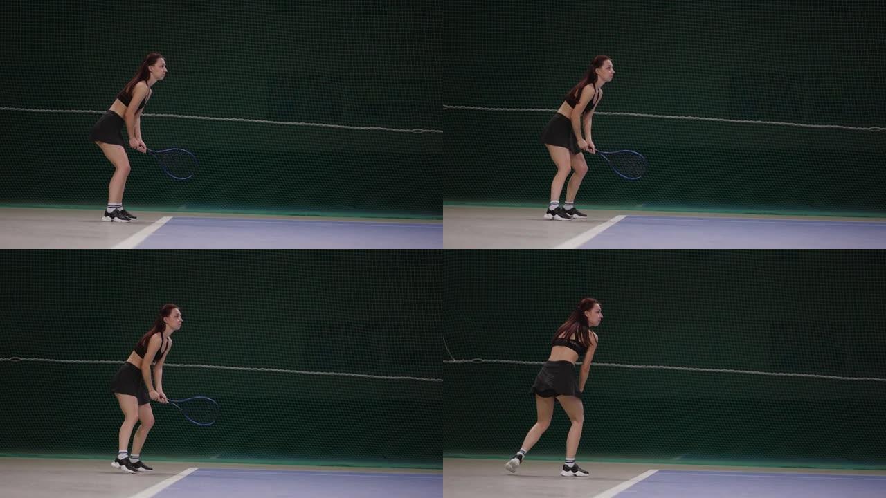 女选手在室内球场打网球，等待发球和球拍击球，慢动作全程射门