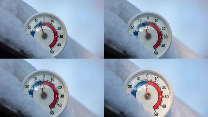 雪中的室外温度计显示温度升高4k延时