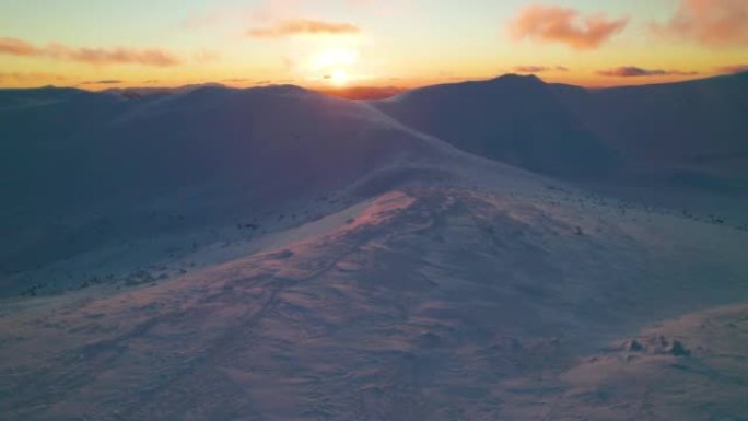 雪山的鸟瞰图夕阳雪山航拍唯美夕阳大气风景
