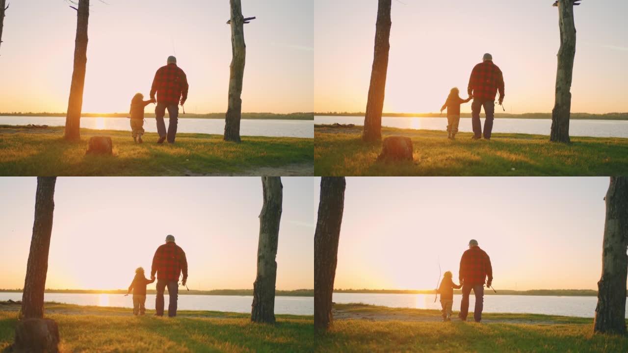 老人和他的孙子在大自然中旅行，在日落时步行到湖边钓鱼，后视
