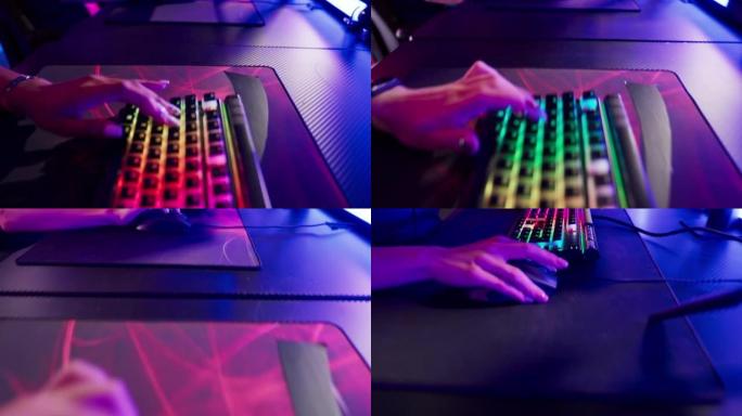 电脑键盘上的特写手。多元化的职业玩家团队与非洲族裔玩家一起参加视频游戏电子竞技锦标赛