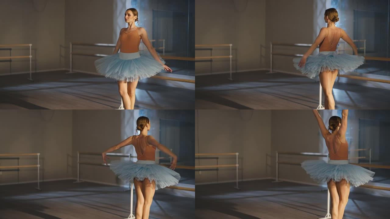 穿着蓝色短裙的自信华丽芭蕾舞女演员在背光的第五位置tip起脚尖旋转。苗条美丽的高加索专业人士在室内排