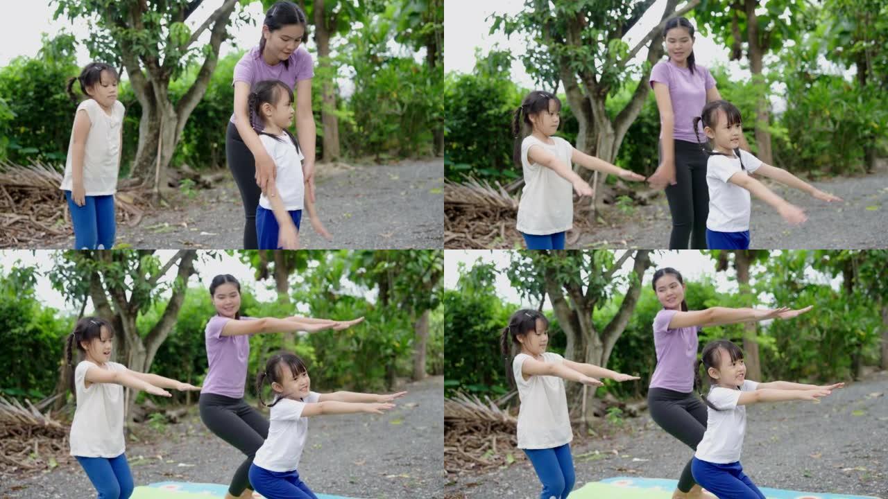 亚洲儿童瑜伽在绿色自然的房子里。