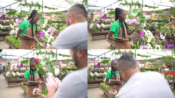 女售货员帮助顾客选择鲜花