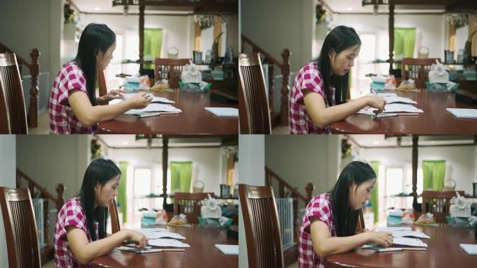 亚洲女会计师为在线财务报告进行计算