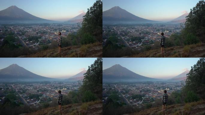 危地马拉火山背景上的人