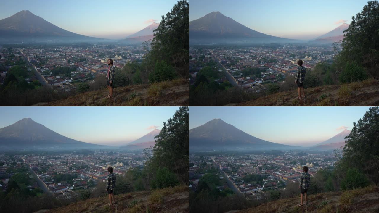 危地马拉火山背景上的人