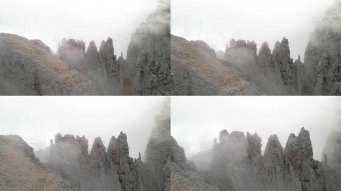 飞越山峰的鸟瞰图山谷山崖悬崖