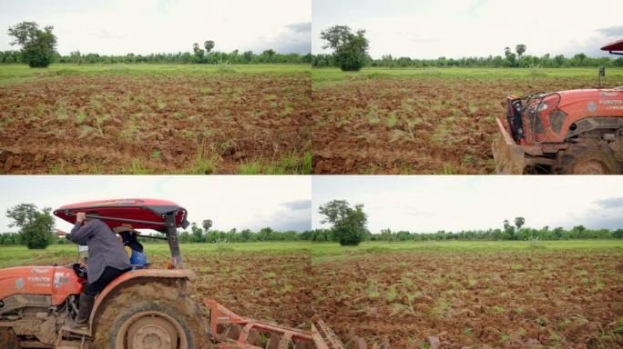 农民和技术，农民在播种前检查土壤。
