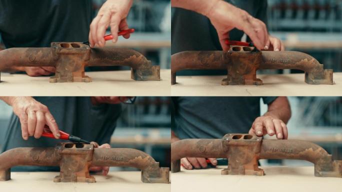 机械师使用工具固定手柄的特写镜头。制造工人修理重型乡村金属机器杆，用机械钳子设备扭转、拧紧或紧固螺母