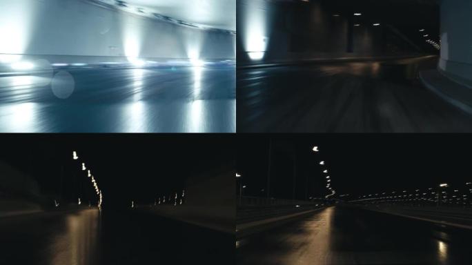 汽车司机第一人称POV跑车在雨夜通过隧道行驶。相机上有强烈的蓝色灯光和雨滴