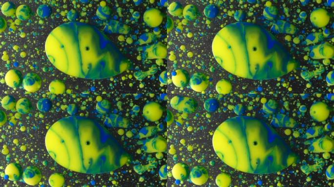 摘要背景鲜艳的彩色气泡慢动作油墨是奇妙的彩色混沌运动气泡结构，美丽，独特，有机。明亮的丙烯酸涂料。粒