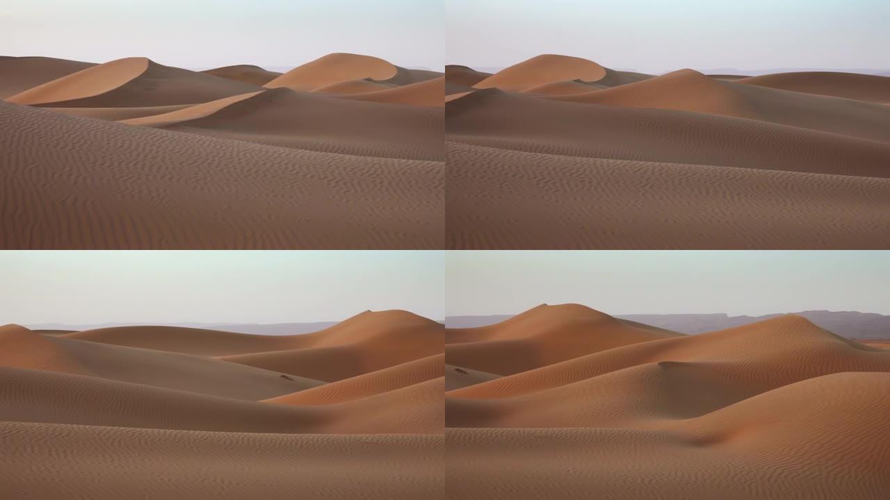 撒哈拉沙漠风中的沙丘中吹沙