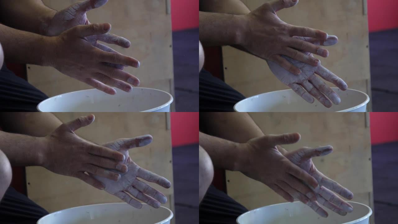 一名体育运动员双手粉刷的慢动作镜头