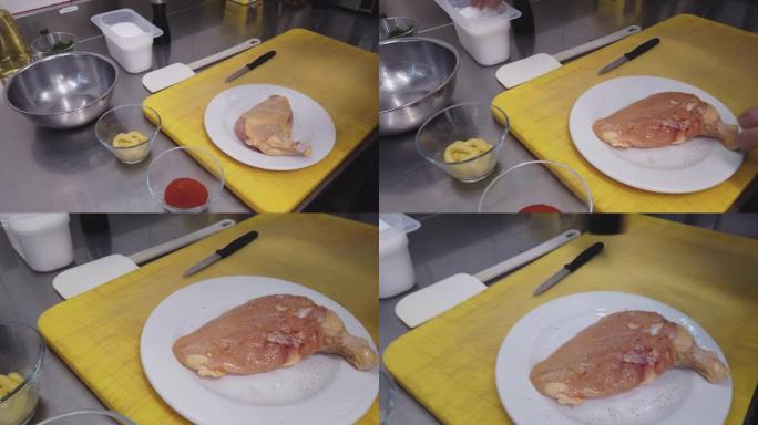 厨师准备鸡肉餐盘的细节照片