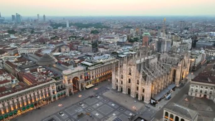 米兰鸟瞰图无人机在日出时拍摄市中心大教堂和大教堂广场