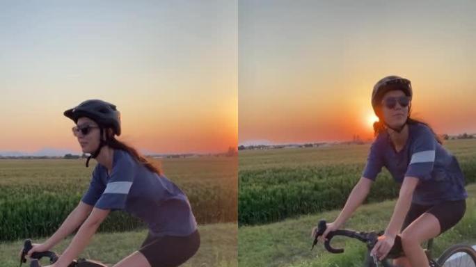 日落时，一名年轻女子在空旷的道路上骑自行车的POV