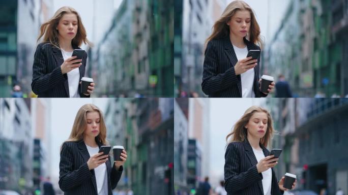 自信和雄心勃勃的女人穿着西装走在市中心，看着智能手机屏幕