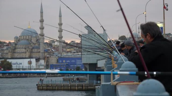 日落时间伊斯坦布尔市著名渔人桥慢动作全景4k土耳其