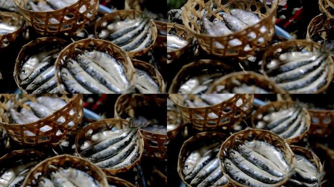 印度尼西亚巴厘岛登巴萨夜间传统市场的篮子里的鱼