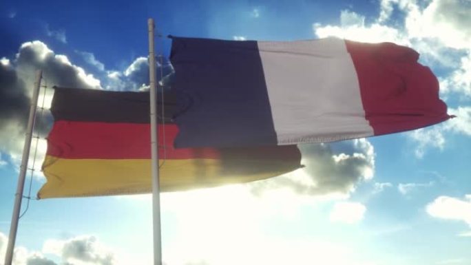 法国和德国旗杆上的国旗。法国和德国在风中挥舞着国旗。法德外交构想