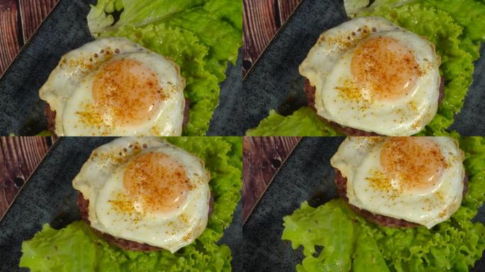 煎蛋生菜肉汉堡的幻灯片。宏多莉，鸡蛋肉排。酮饮食的营养元素。减肥食品。健康食品概念。