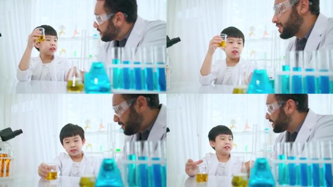 Young Asia kid doing experiment with foreigner tea