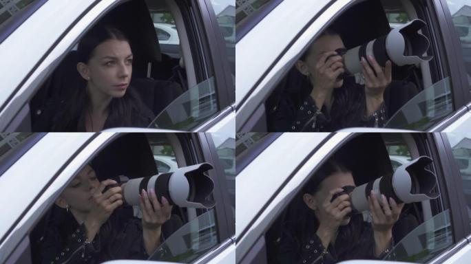 年轻女子狗仔队摄影师抓拍照片从汽车。怀疑嫉妒的妻子侦探间谍使用大的专业相机。