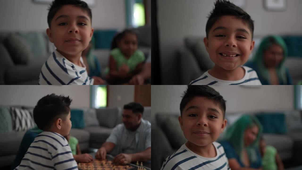 一个男孩在家与家人下棋的肖像