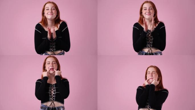 4k video of  woman who whistles on pink background