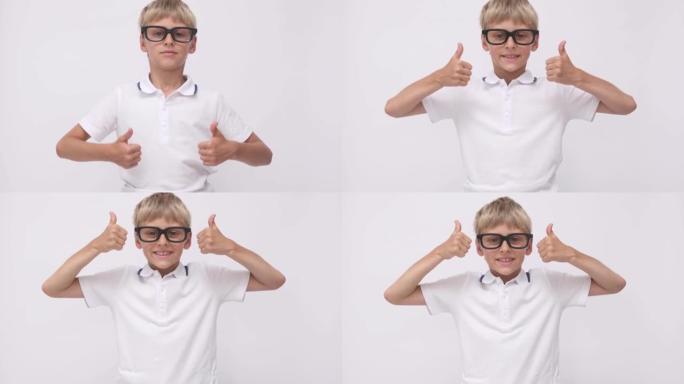 白色背景上戴着眼镜的肖像男生。回到学校。有趣的男孩竖起大拇指微笑。学生欢笑而欢喜。快乐积极的孩子。快