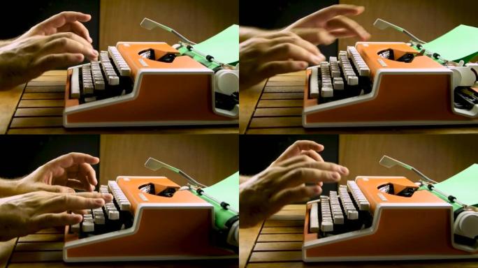男人用老式打字机打字。旧机械橙色，白色。绿皮书。